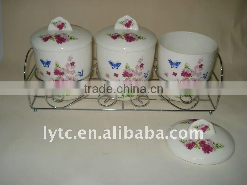 round ceramic salt & pepper shaker with metal stand