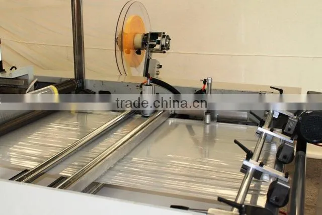 Fully automatic draw tape garbage bag making & folding machine