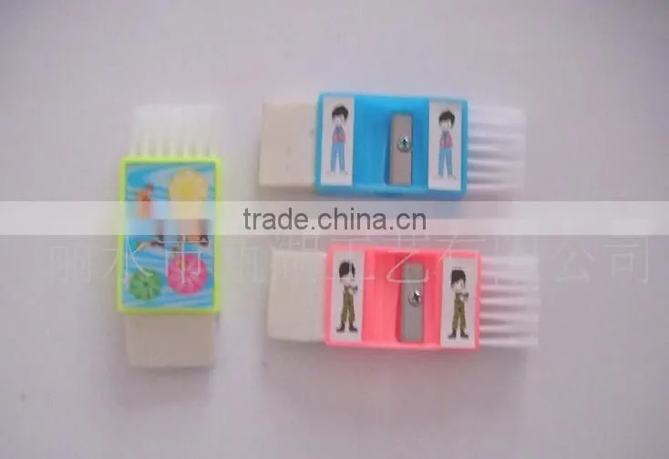 Plastic sharpener with eraser and brush