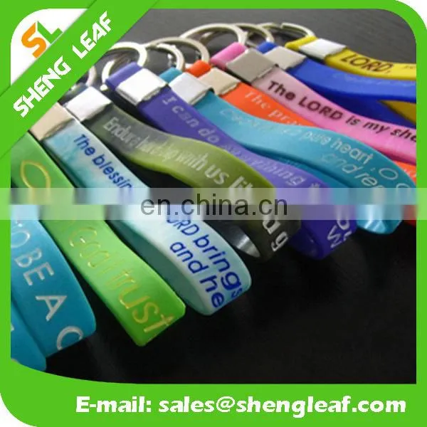Hot sale silicone rubber bracelet key ring , 100% silicone wristband key chain , screen printing silicone keychain