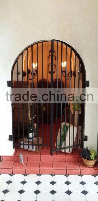 wrought iron cellar door with glass
