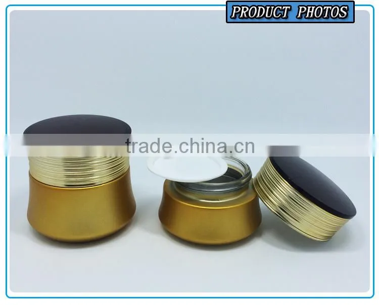 Gold yellow coloured cosmetic glass bottle and cosmetic glass cream jar