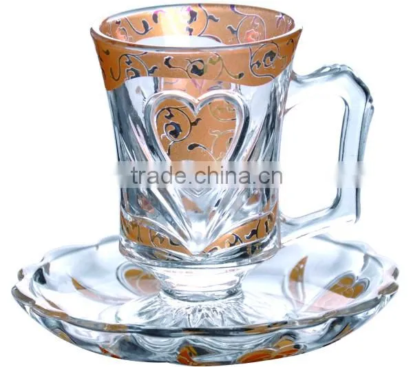 Glass coffee cups and saucers