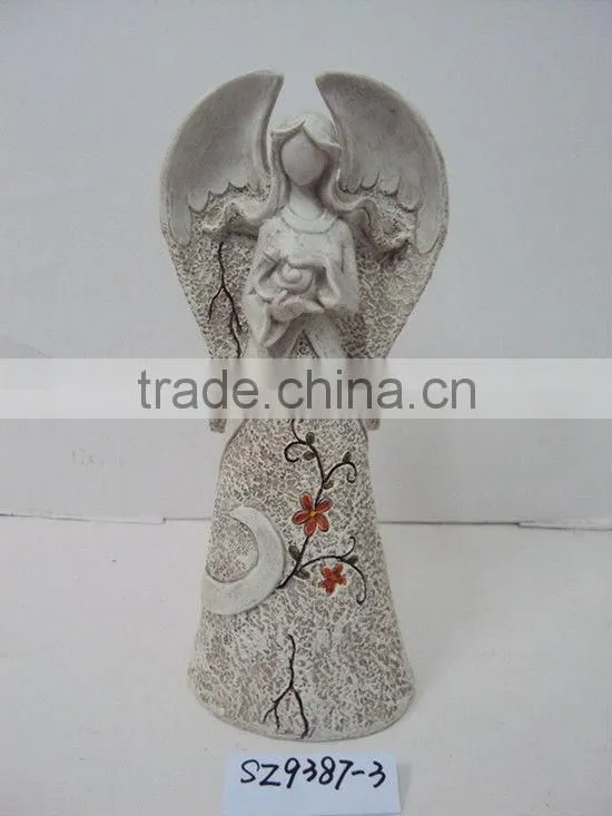 Resin fairy with a snail statue sculpture