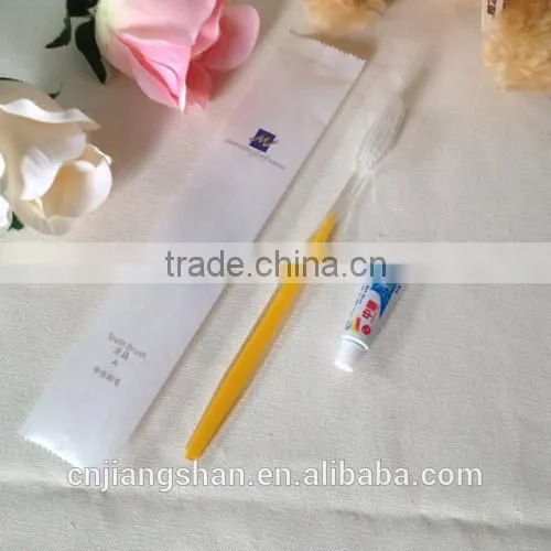 disposable toothbrush and hotel tooth with toothpaste