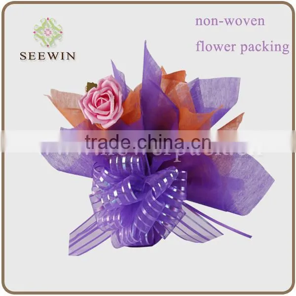 Nonwoven flower sleeve
