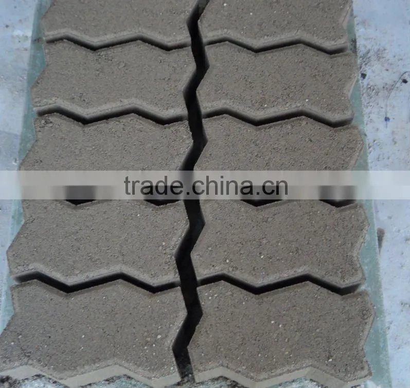 Hydraulic cement road brick making machine