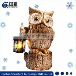 Regal Santa statue and Sledding Santa Figurine