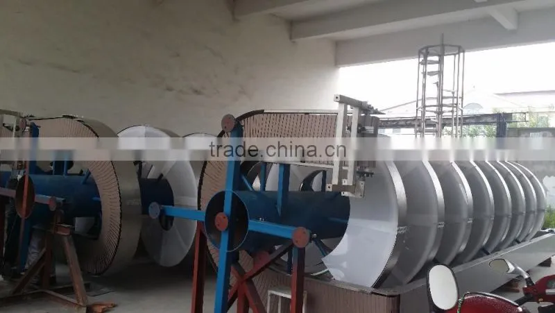Spiral conveyor cartons lifter