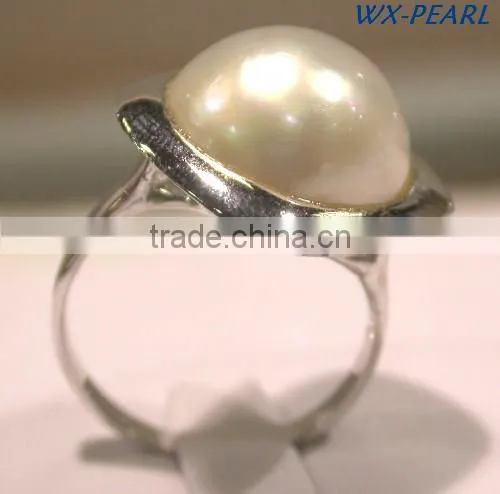 Cross charm ring and a tiny freshwater pearl ring Tahitian Pearl Ring