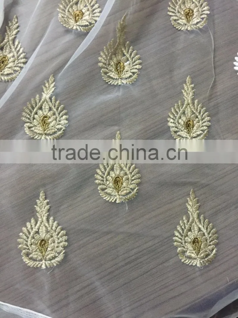 Zari embroidery thread motif on net fabric
