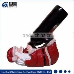 Regal Santa statue and Sledding Santa Figurine