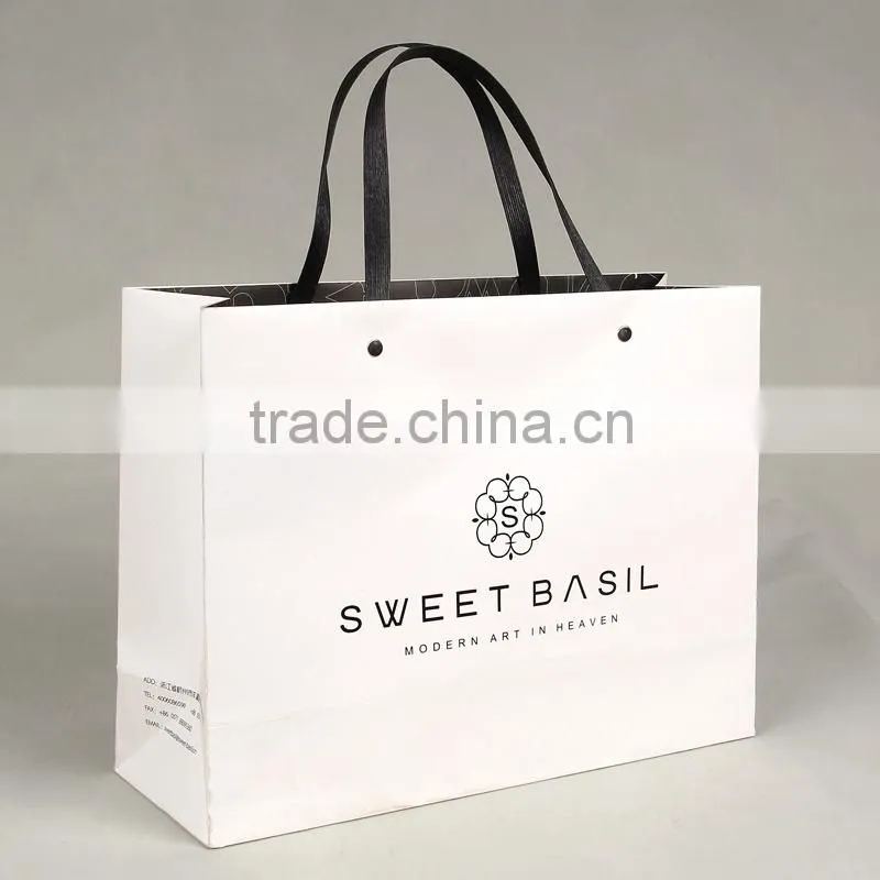 Recyclable medium hand length handle specialty paper bag for shopping packaging