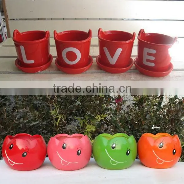 face design terracotta unglazed ceramic flower pot