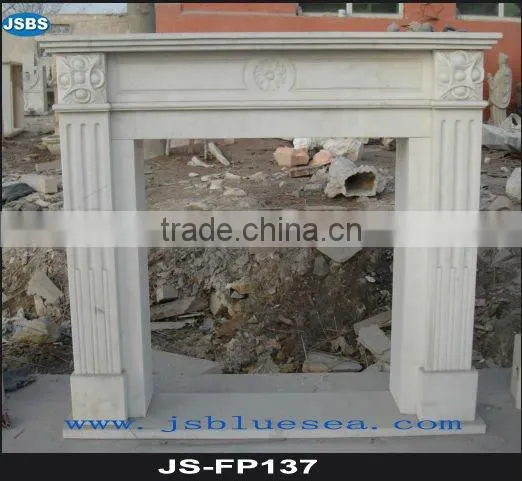 Hand carved stone fireplace surround
