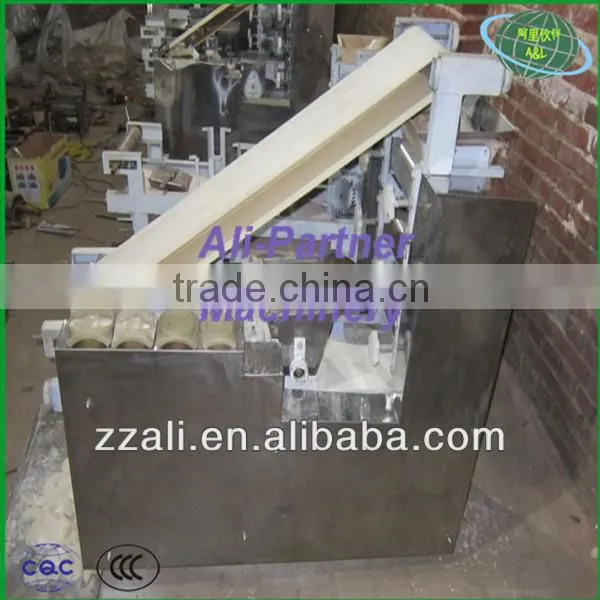 High speed round wrapper forming machine