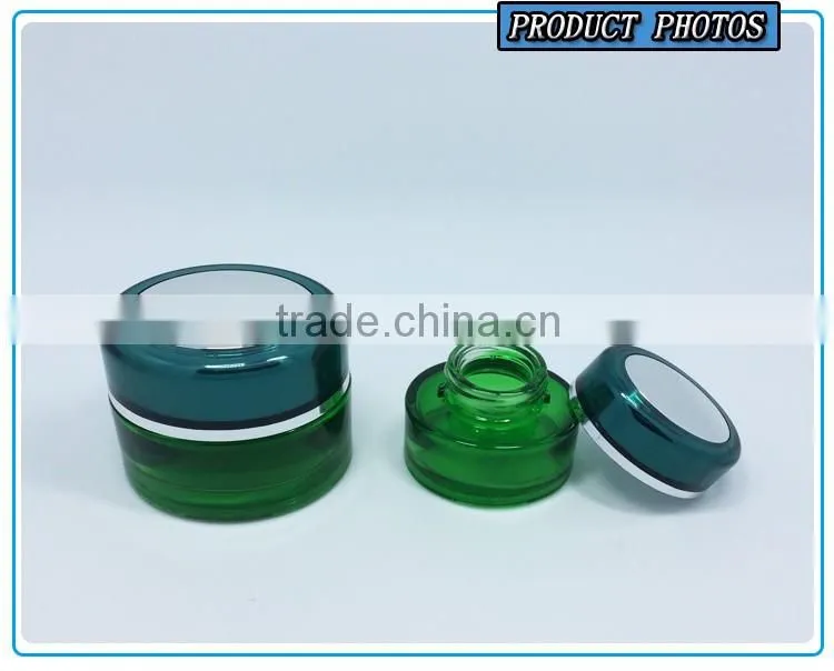 Green colored glass pump lotion bottle and cosmetic glass cream jar