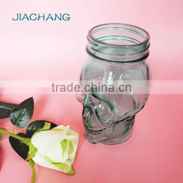 blue skull shape glass beverage coffee jar with blue tin lid