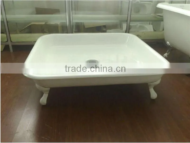 square enameled cast iron shower pan of base with clawfeet