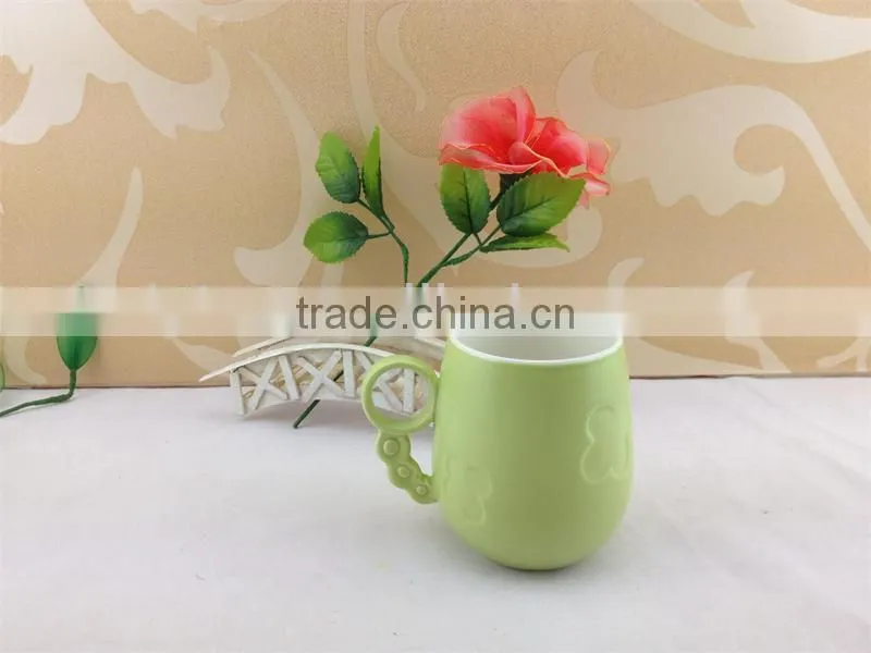 round handle embossed butterfly ceramic cup