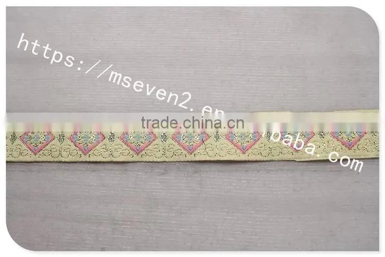 Hot selling 2.5cm width gold yarn embroidery webbing belt for garment