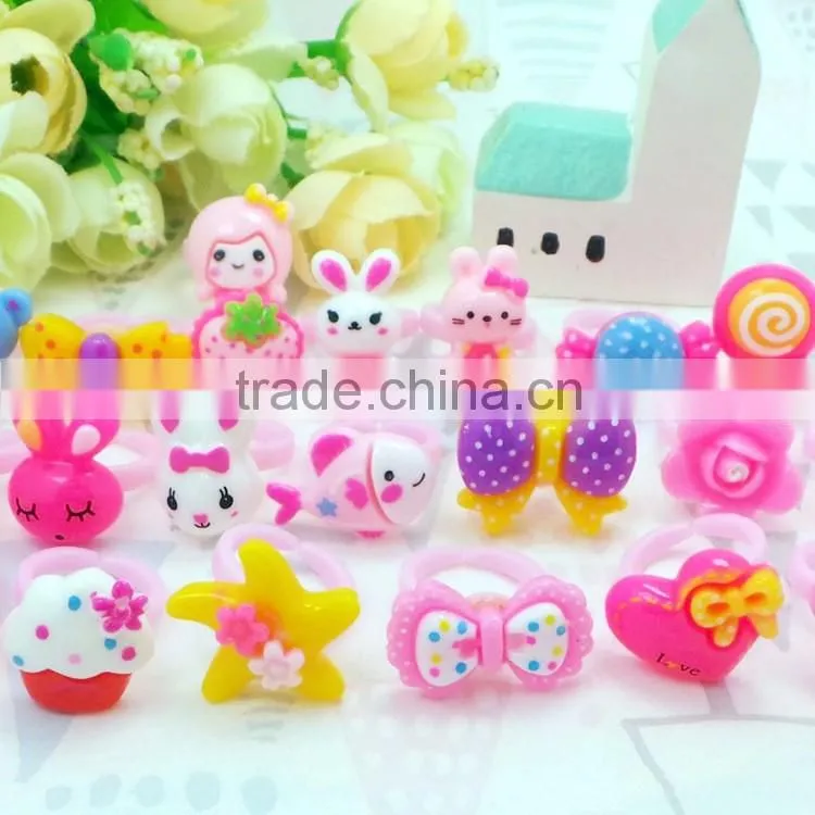 Cute babies wear many types plastic rings for girls