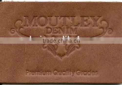 Custom embossed brown leather patch for jeans and shoes