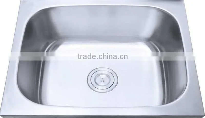 Wash basin above washing machine with steel grating