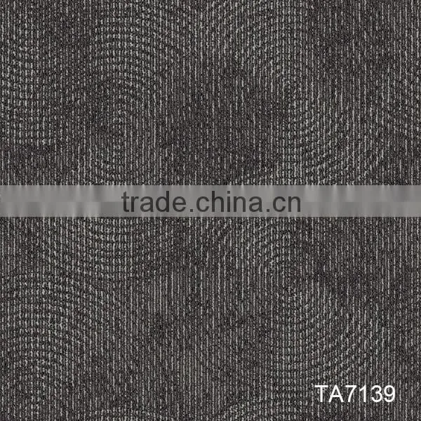 Durable level loop carpet tiles with PVC backing