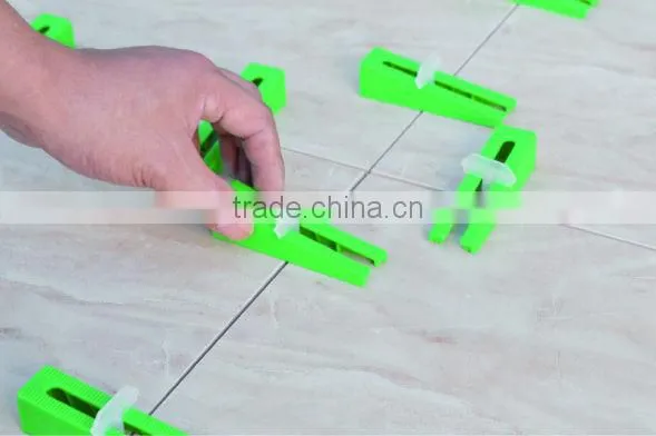 Tile Leveling System, Lippage leveling spacer and cap wedges