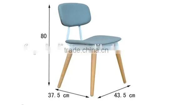 blue fabric upholstered dining room chair with leather