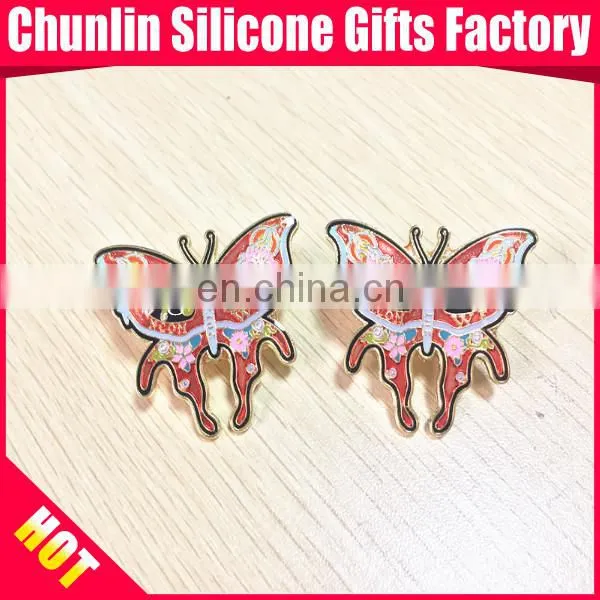 carved lapel pin with resin