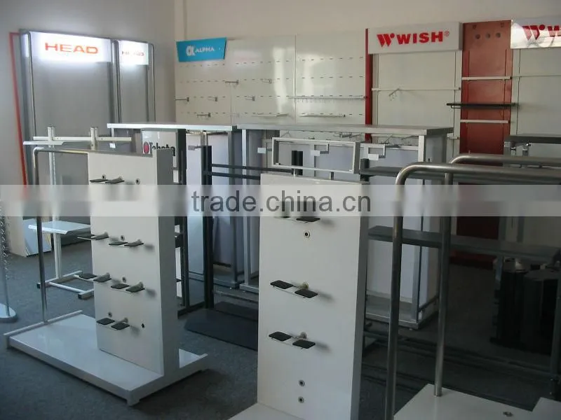 Double side wall display fixture with wheel
