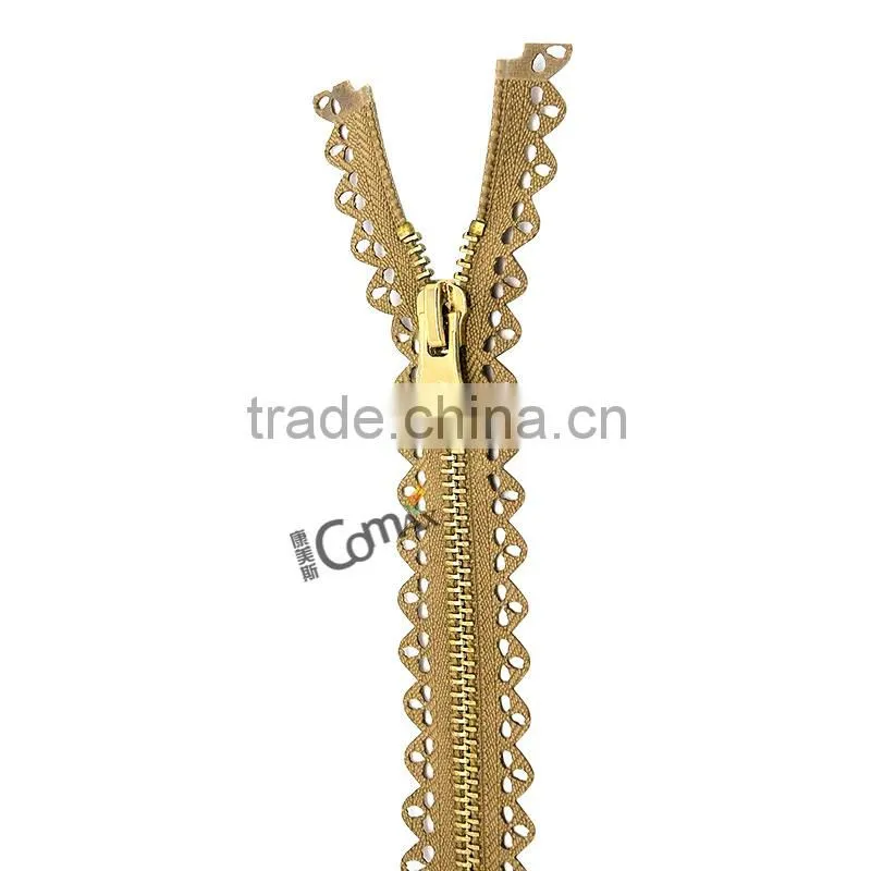 One close Euro style shiny gold metal zip for bag