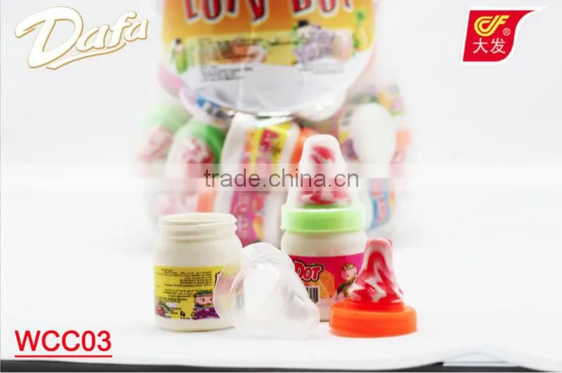 powder candy with lollipop in nipple bottle