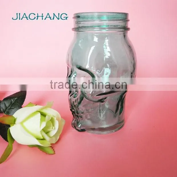 blue skull shape glass beverage coffee jar with blue tin lid