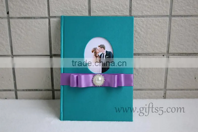 Unique wedding guest book with ribbon bow