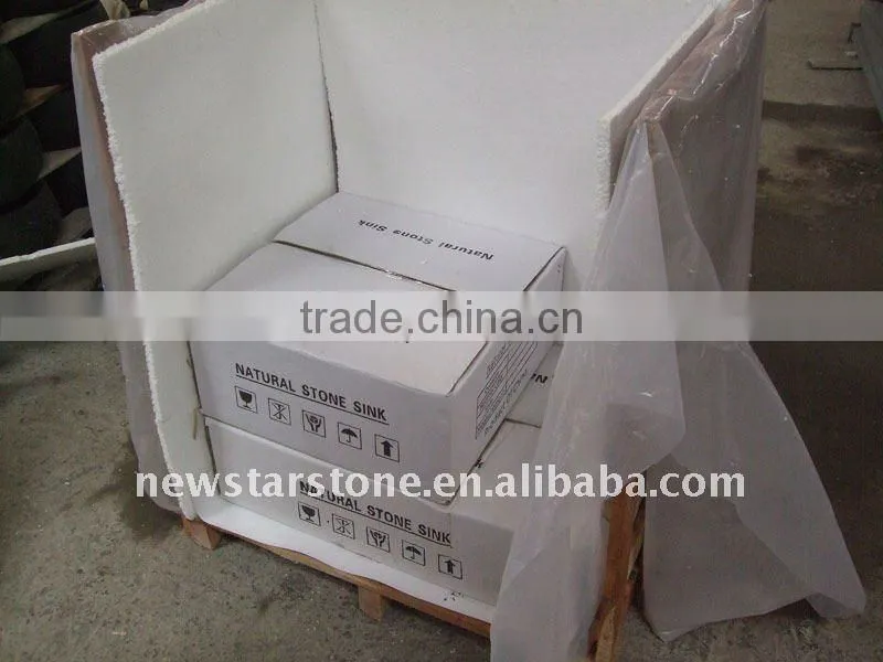 beige round marble bowl