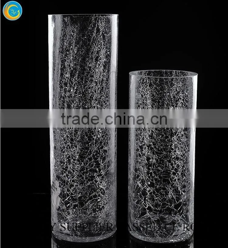 Clear glass cylinder vases and candle holders