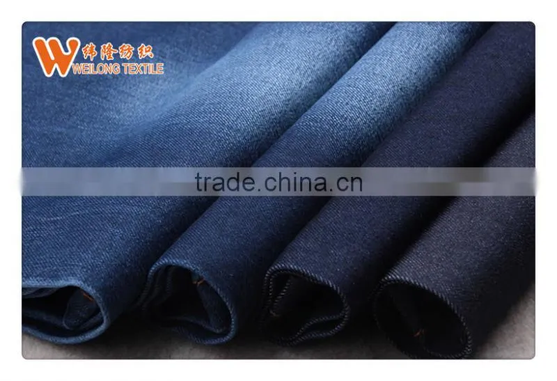 Denim stocklot men's suit fabric/Foshan Supplier stretch jean fabric