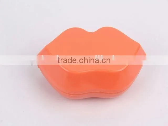 Lip shaped plastic massage comb with mirror/hair brush