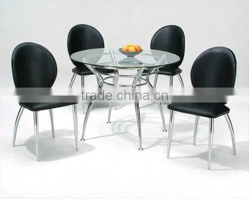 Round dining table and black dining chairs