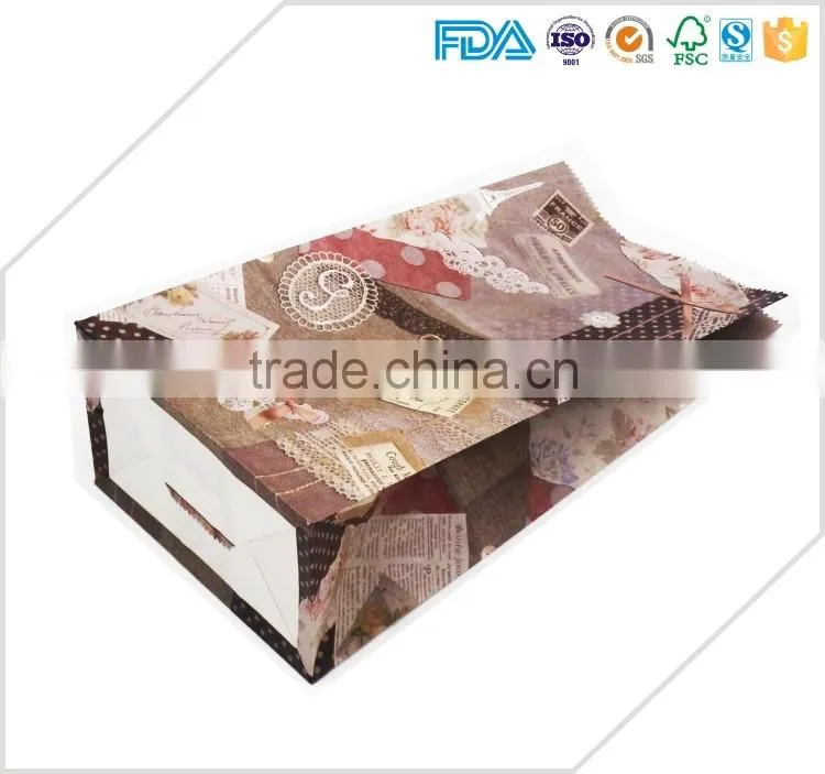 Wholesale prices logo printing colorful christmas gift packaging paper bag for gift