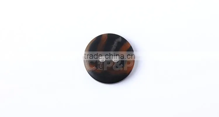 Two hole custom designer button with eyelet