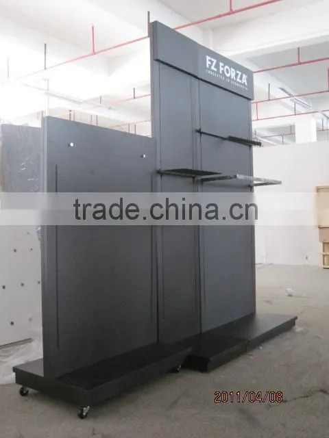 Double side wall display fixture with wheel