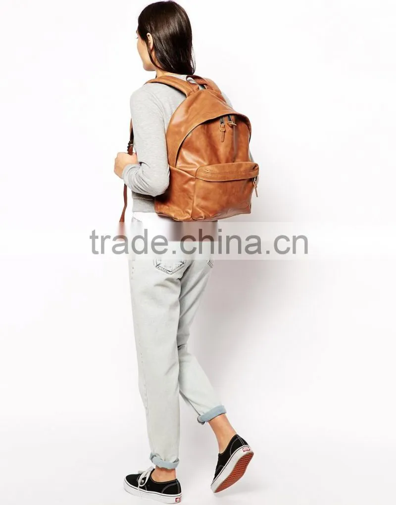 Tan color cross body leather bag
