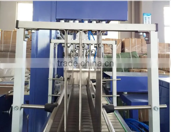 Professional full automatic film shrinking wrapping packing machine for PET bottle