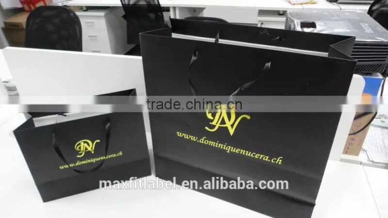 china factory cheap Christmas custom paper bags with handles