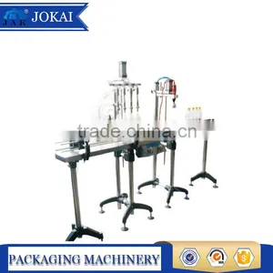 Semi-automatic Overflow Filling Machine for Beverage, Milk, Vinegar, Oral Liquid, Lotion, Disinfectant Fluid, Detergent Liquid thumbnail-1