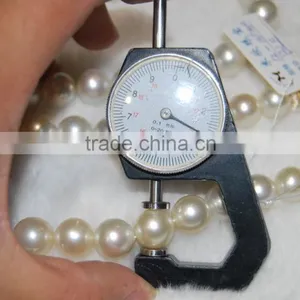 12-13mm AA White Round South Sea Pearl Strands thumbnail-1